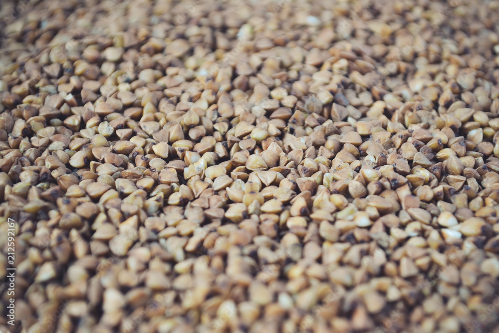 Raw buckwheat groats. Diet, healthy diet, natural product Raw buckwheat groats. Diet, healthy diet, natural product