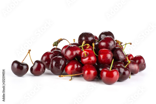 Sweet bright red cherry stack isolated on white...........................................................................