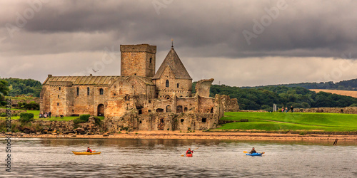 Kyakers in front of Inchcolm Abbey photo