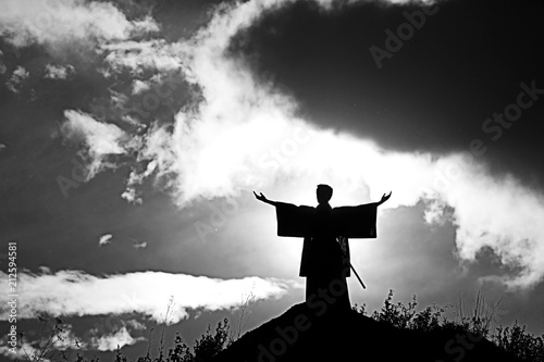 Silhouette monk on the mountain prayer moses faith god