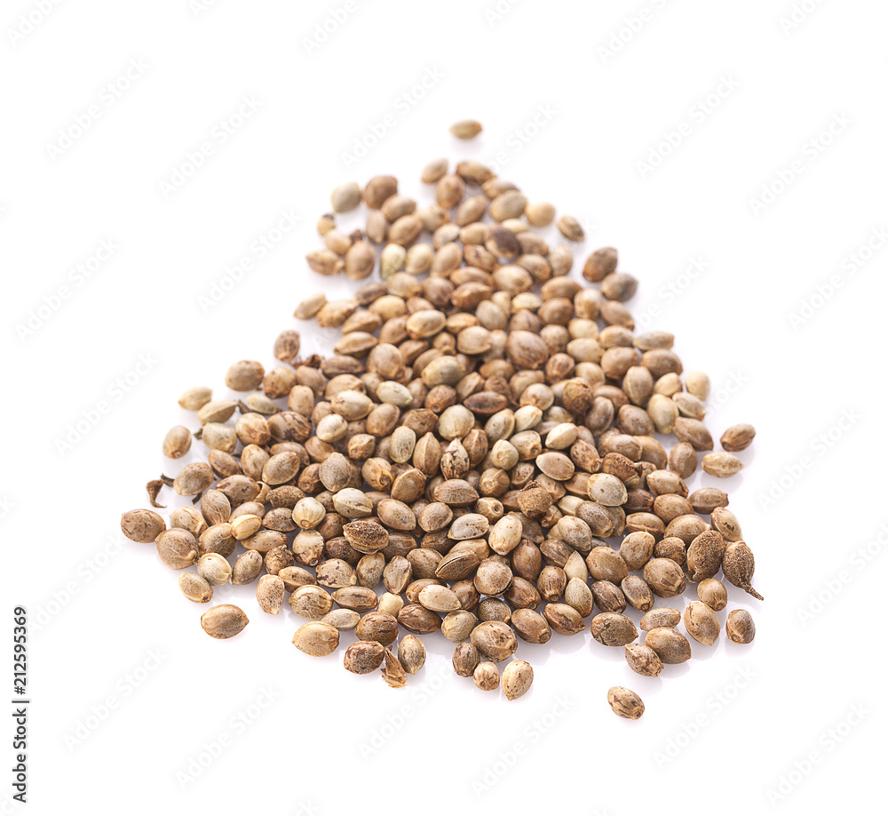 Heap of hemp seeds on white background