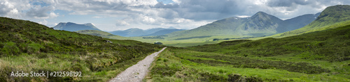 a view of the west highland way in the highlands of scotland during a bright summer day