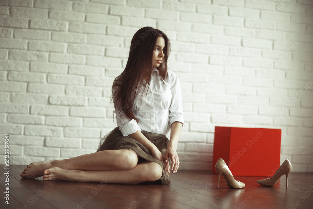 Fashion portrait of a young beautiful adult brunette girl Fashion portrait of a young beautiful adult brunette girl