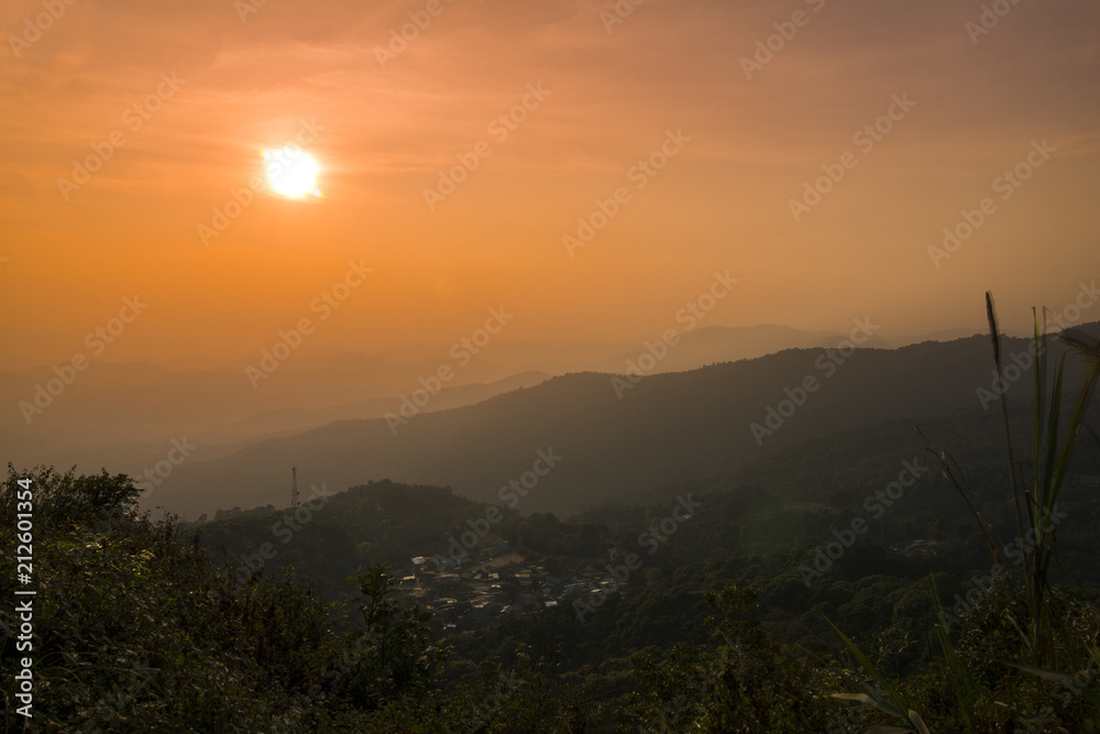 twilight sky and silhouette mountain and Doi Pui village