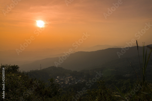 twilight sky and silhouette mountain and Doi Pui village