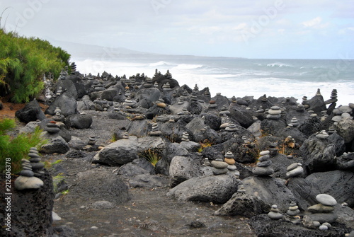 Reunion island seascape, landscape. Black sand, volcanic rocks.