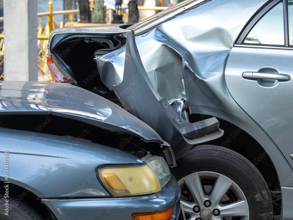 Car crash accident on street with wreck and damaged automobiles. Accident caused by negligence And lack of ability to drive. Due to illness Car crash accident on street with wreck and damaged automobiles. Accident caused by negligence And lack of ability to drive. Due to illness