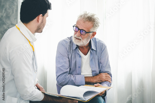 Fototapeta Psychologist doctor discussing with patient