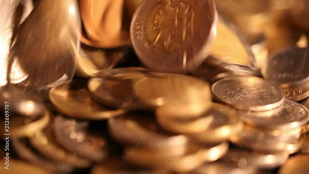 Treasure of gold coins - gold coins fall from above, shine and sparkle Treasure of gold coins - gold coins fall from above, shine and sparkle