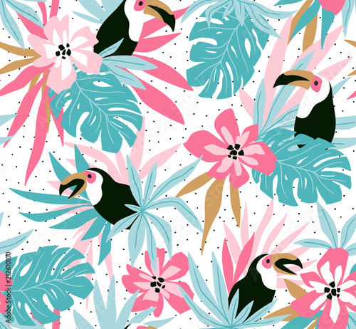 Floral background with tropical flowers, leaves and toucans. Vector seamless pattern for stylish fabric design.