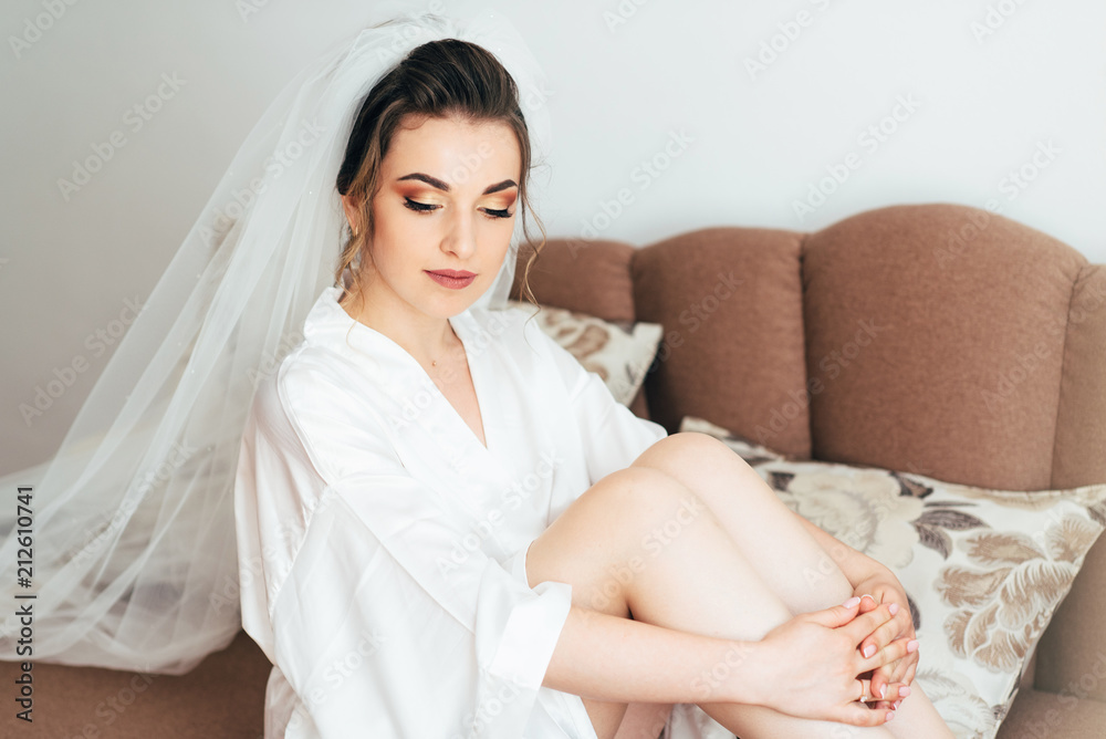 Beautiful happy bride with wedding hairstyle bright makeup in br Beautiful happy bride with wedding hairstyle bright makeup in br