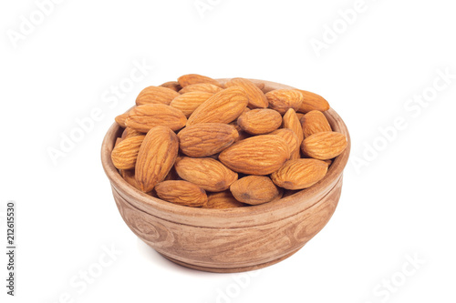 Almond nuts  in brown cup isolated on the white background