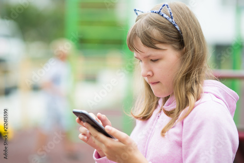 Teenage girl with a phone
