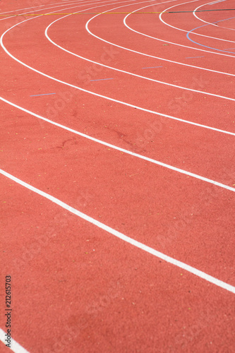 All-weather running track , orange and white lanes for running training