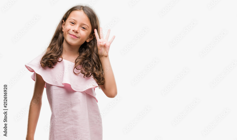 Brunette hispanic girl wearing pink dress showing and pointing up with fingers number four while smiling confident and happy. Brunette hispanic girl wearing pink dress showing and pointing up with fingers number four while smiling confident and happy.