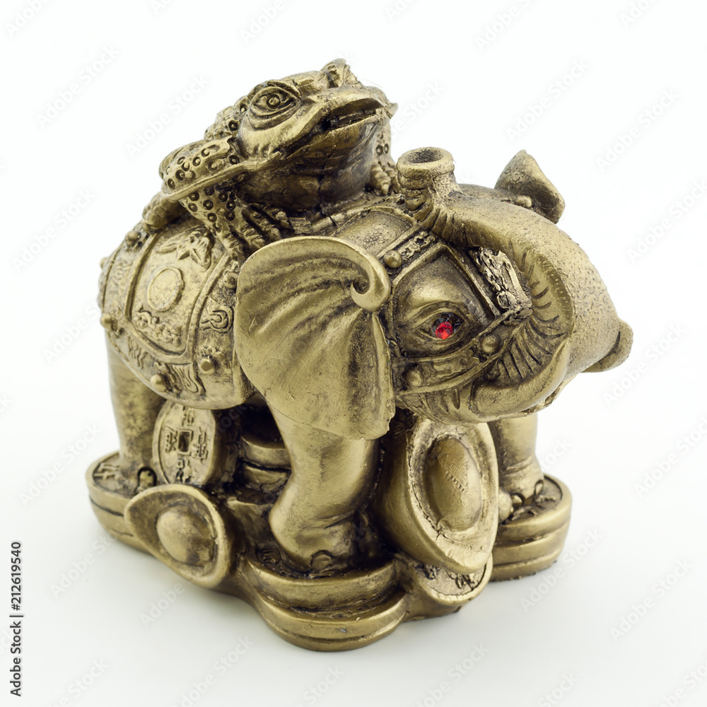 Bronze elephant and a frog on a white background Bronze elephant and a frog on a white background