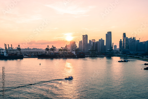 singapore skyline in evening time, view from open deck of a cruise ship
