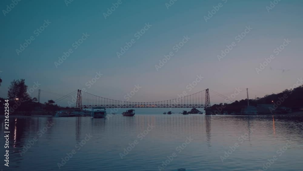 View from boat on Yellow Bridge during sunset in Bali, Indonesia View from boat on Yellow Bridge during sunset in Bali, Indonesia