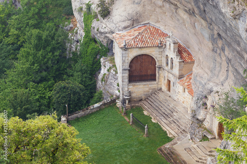 Ancient hermitage and cave of Saint Bernabe, in Ojo Guarena natural park, in Burgos, Castile and Leon, Spain. photo