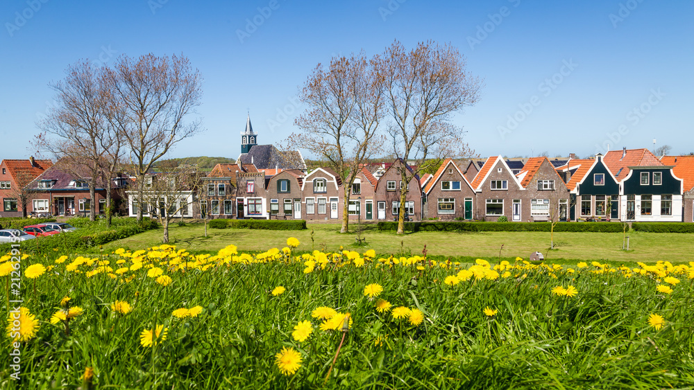 Panorama Village Oudeschild with Zeemans church and trraditional gable  houses on the Wadden island Texel in the Netherlands