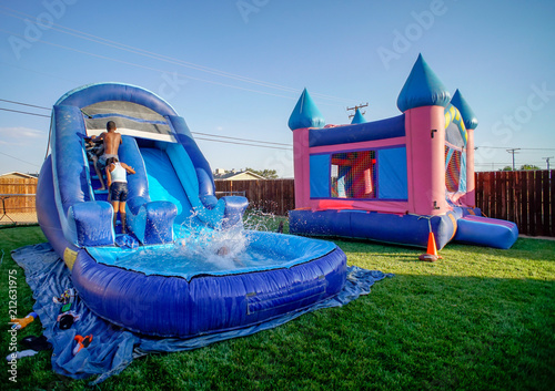 water slide, bounce house, kids, kids playing, children, children playing