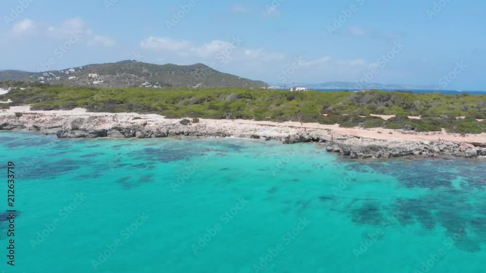 Amazing aerial view of beach in Ibiza coast, turquoise waters Amazing aerial view of beach in Ibiza coast, turquoise waters