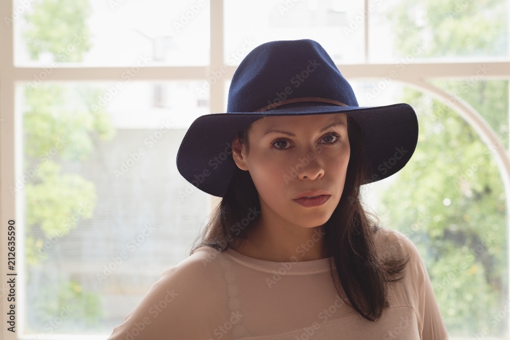 © Wavebreak Media - Female executive looking at camera in office © Wavebreak Media - Female executive looking at camera in office