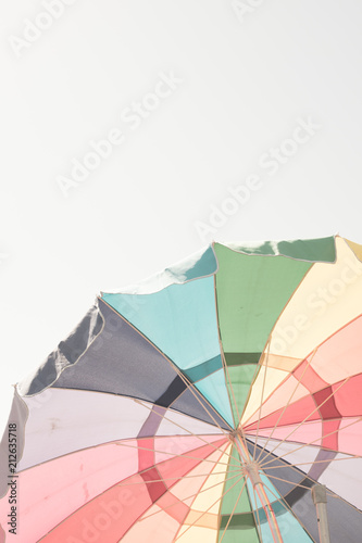 Vintage colorful beach parasol or umbrella