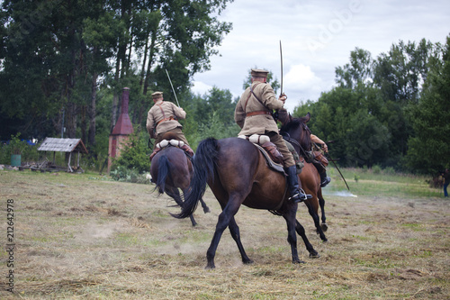 Polish cavalry are riding horses. Polish cavalry shows
