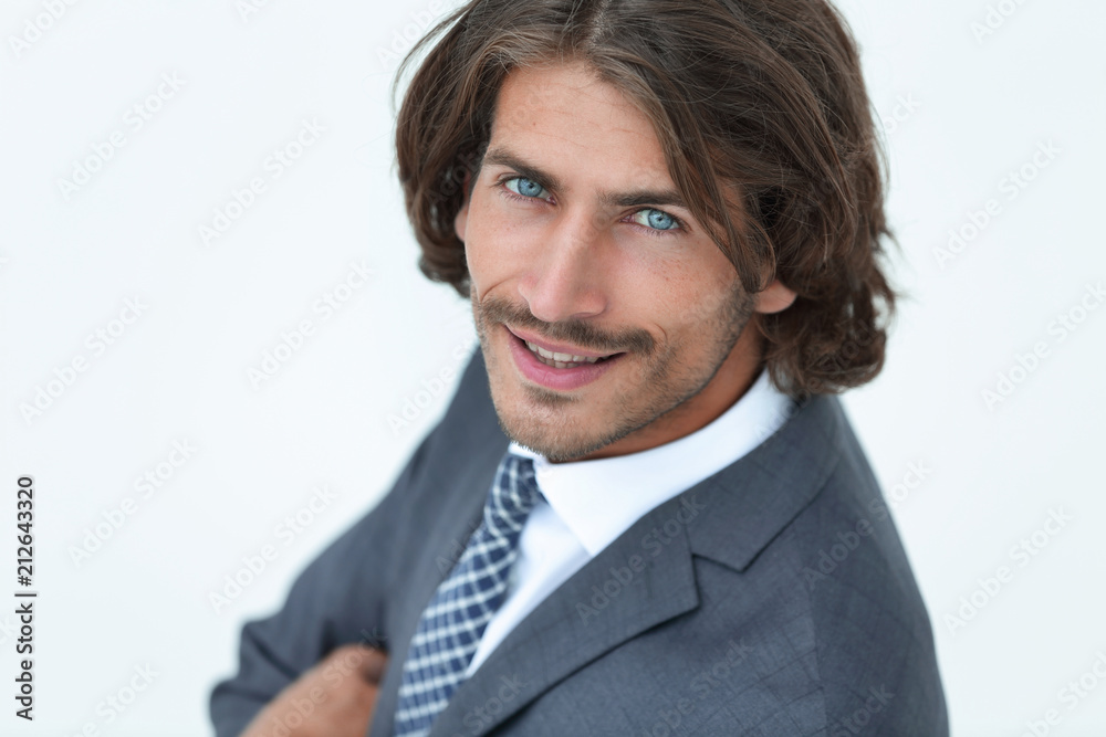Close up portrait of an attractive young businessman smiling Close up portrait of an attractive young businessman smiling