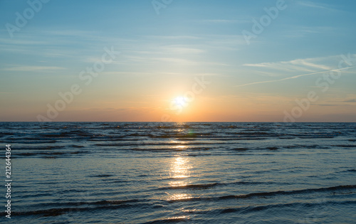 Sunset over the sea. Photograph from the beach.