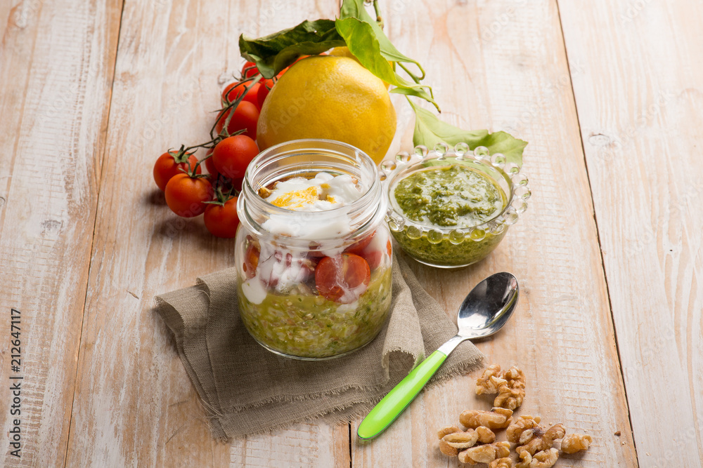 spelt with pesto tomatotes yogurt sauce and grated lemon peel spelt with pesto tomatotes yogurt sauce and grated lemon peel