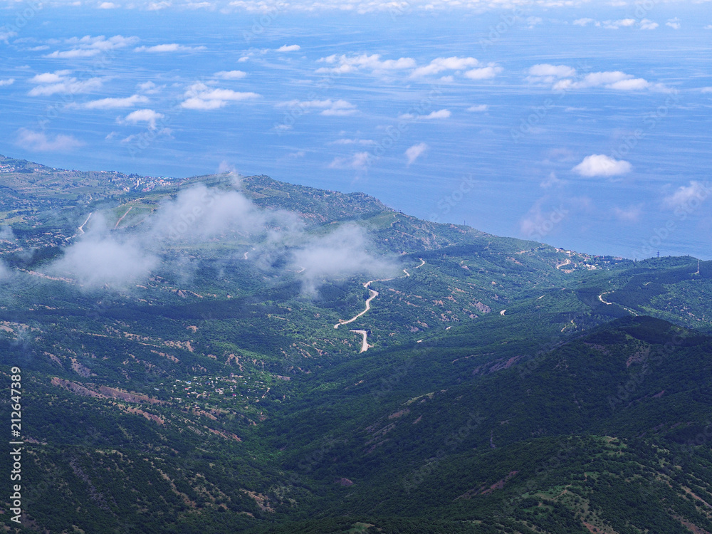 Mountains of the crimea and the green forest and village