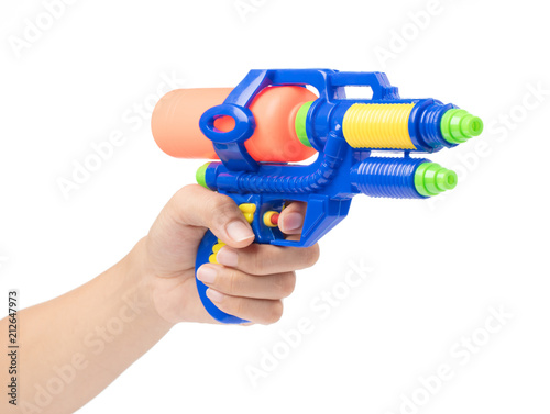 Gun water toy on hand isolated on a white background