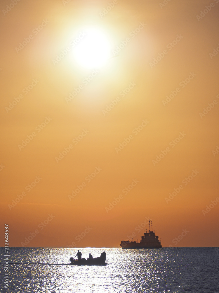 Ship at the sea during sunrise