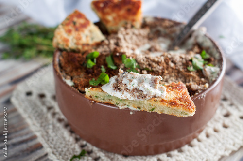 Hot spicy dip with jalapenos, cheese and herbs