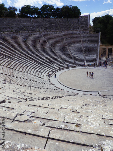 Epidaurus, Greece ,April 24,2016.Turists admire the ancient theater of the Epidaurus