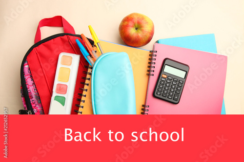 school bag with school supplies photo