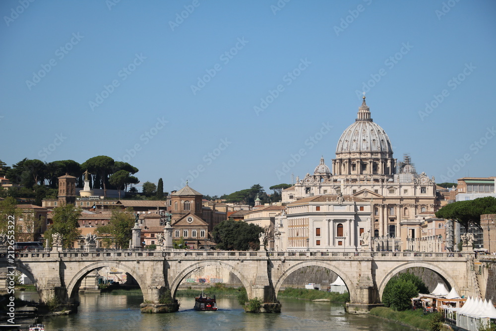 View to Vatican city and Statue of Ponte Vittorio Emanuele II in Rome, Italy 