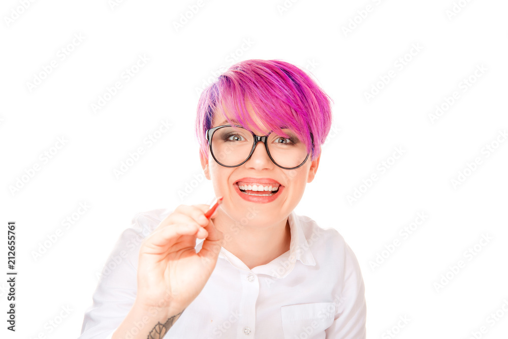 Happy woman with pencil smiling at camera