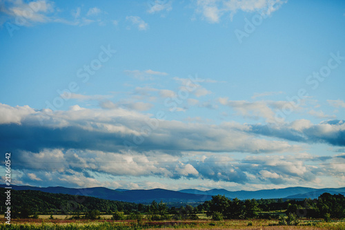 landscape, sky, nature, mountain, clouds, grass, mountains, blue, green, summer, hill, cloud, forest, view, tree, hills, beautiful, field, meadow, lake, rural, countryside, travel, water, panorama