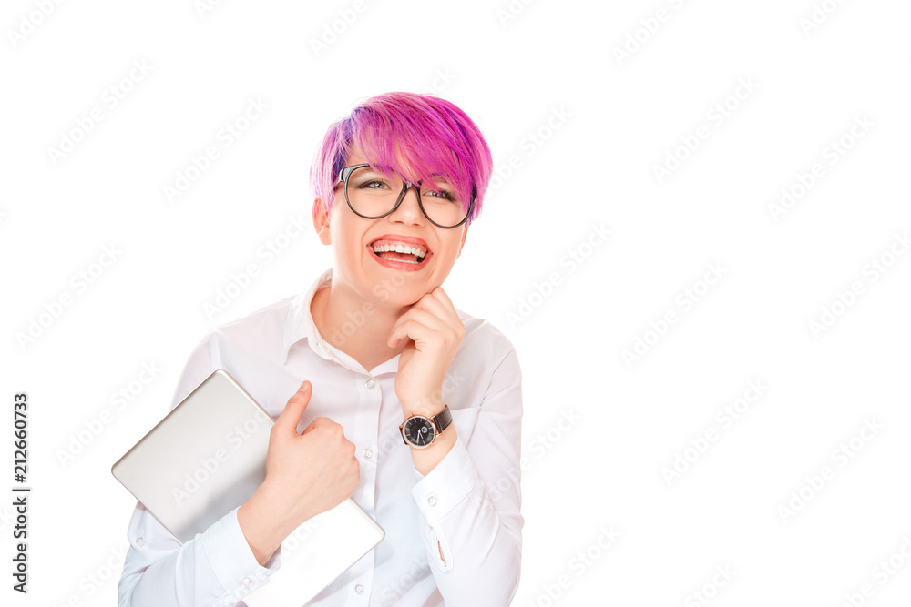 Laughing woman with?tablet in hands looking away