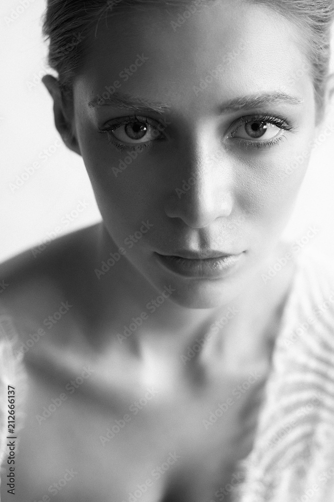 Beautiful girl of European appearance. Red hair with a touch of honey.Beauty shooting.