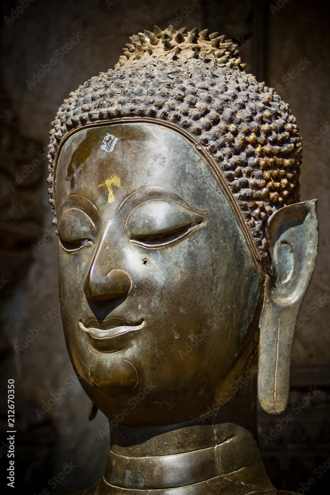 Ancient Buddha head statue