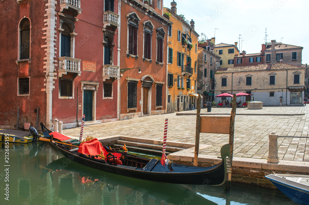 Gondola parked at small piazza, Venice