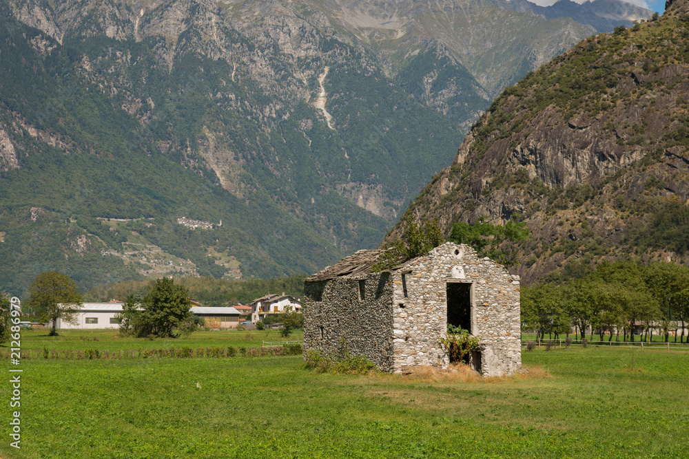 Ancient farmhouse in Alps foothills Ancient farmhouse in Alps foothills