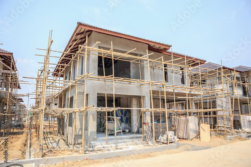 house under construction with autoclaved aerated concrete block structure at building site