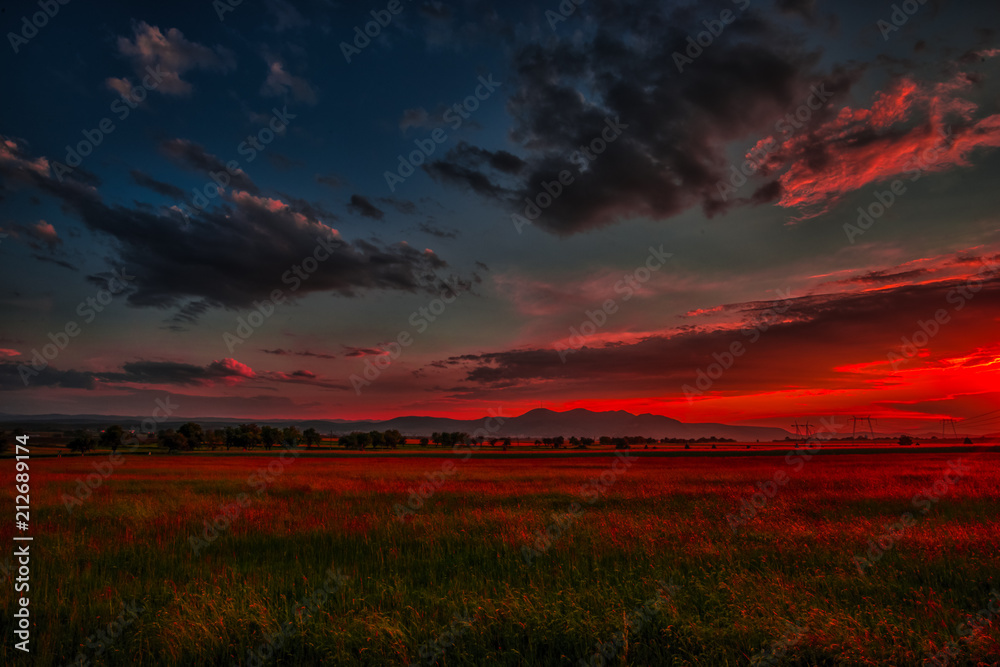 Fototapeta premium Dramatic Clouds at the sunsdet
