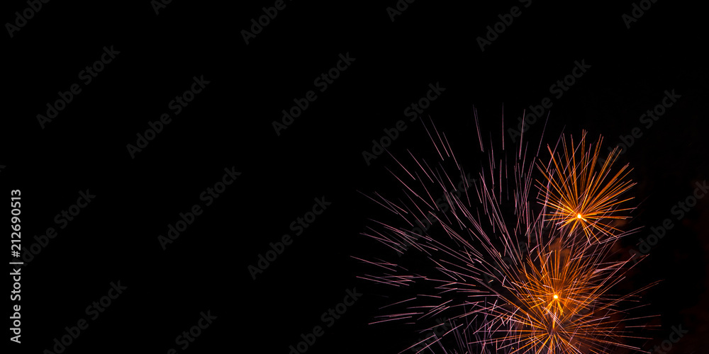 Spiky Orange and Purple Fireworks Background