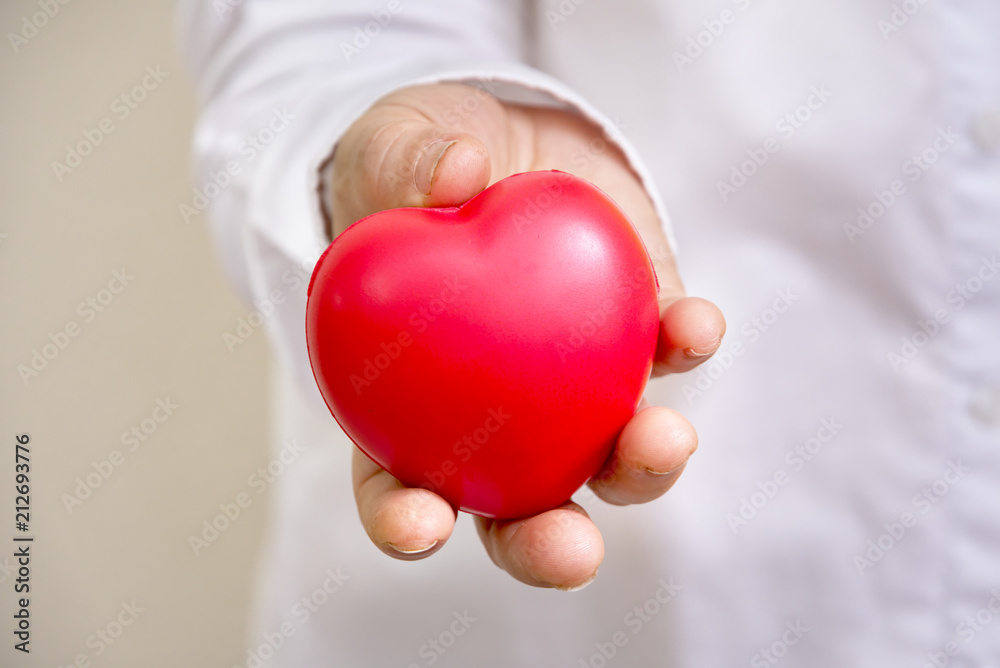 Red heart on chilaren hand Red heart on chilaren hand